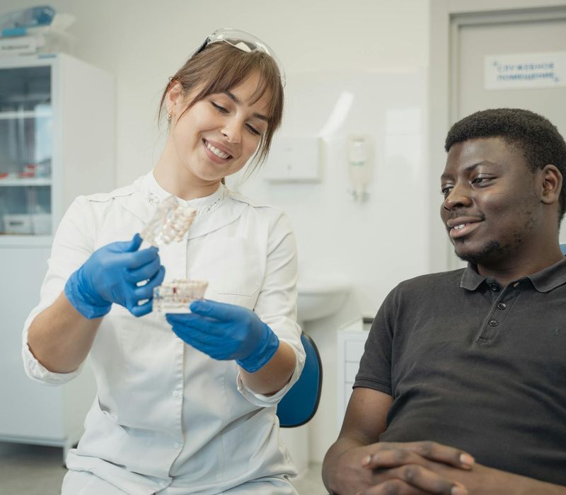 Friendly educational counselor assisting with enrollment process