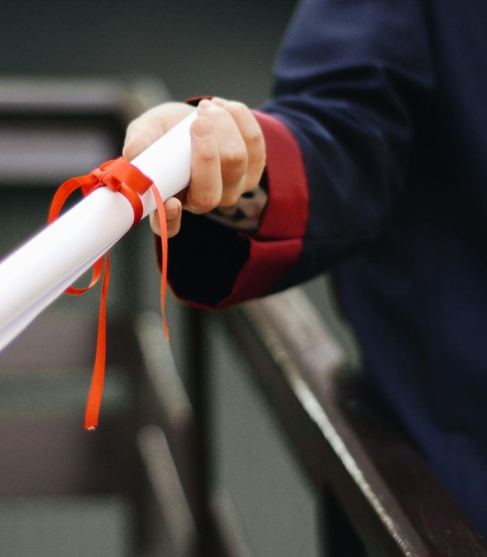 Successful graduates celebrating international certification achievement